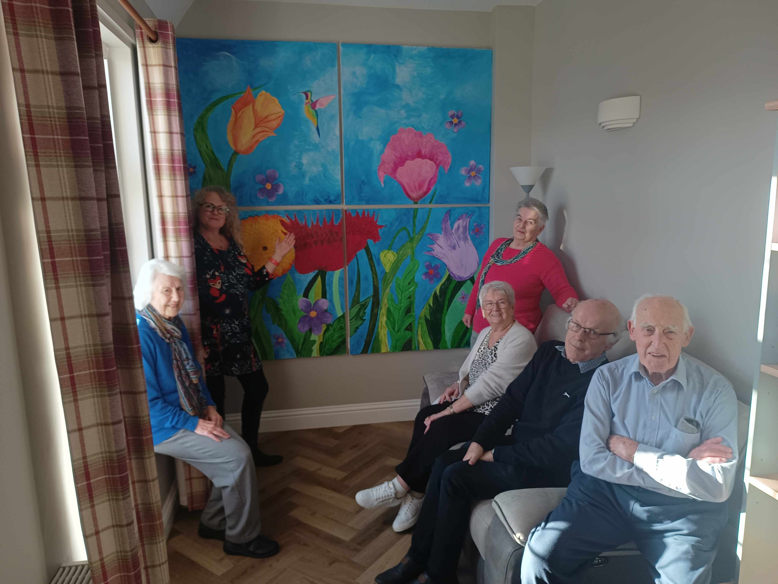 Residents’ Art Group creates stunning feature wall for the Meadow Lounge